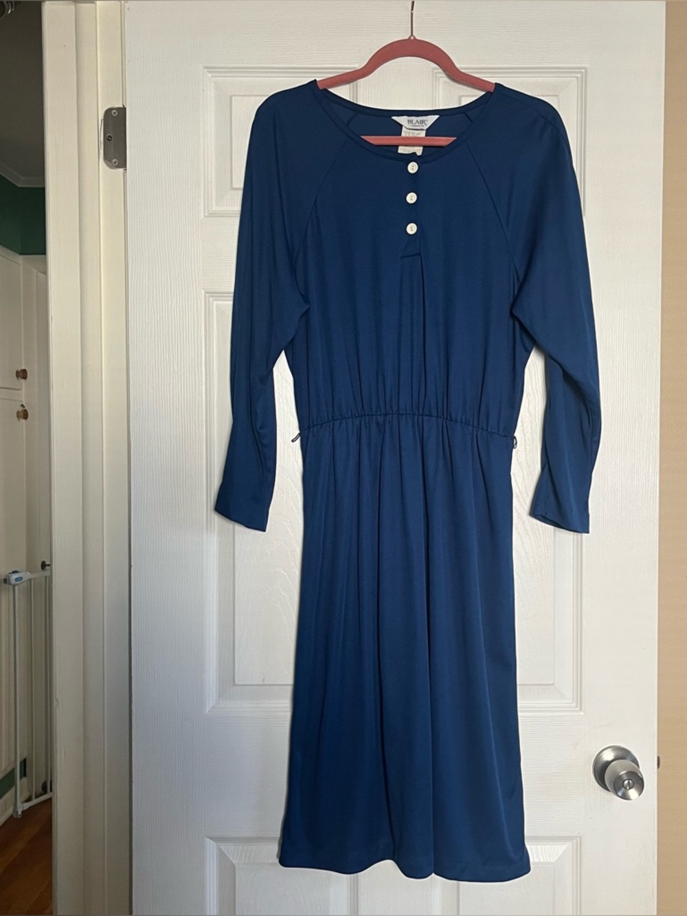 Blair lightweight blue knee length dress with long sleeves and fauxbutton front